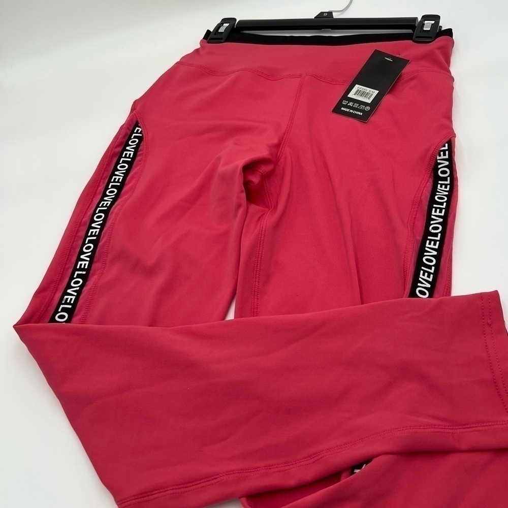 Woman’s pink activewear. Size small/medium athletic wear. Brand new with tag.